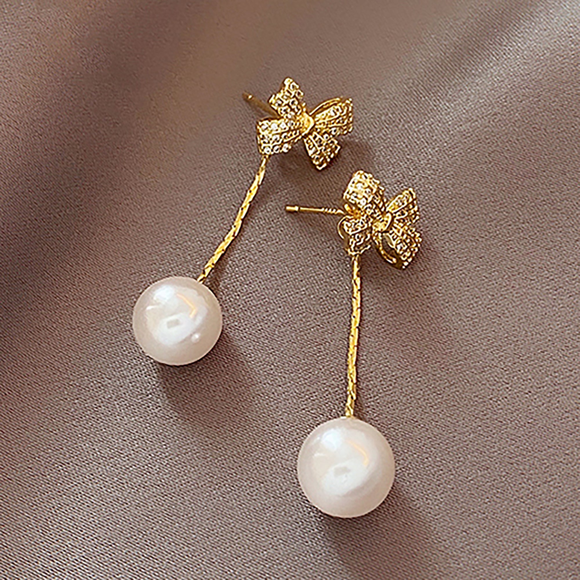Gold Plated Pearl Dangle w/ CZ Bow Earrings
