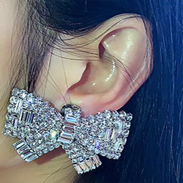 White Gold Plated w/ CZ Bow Stud Earrings